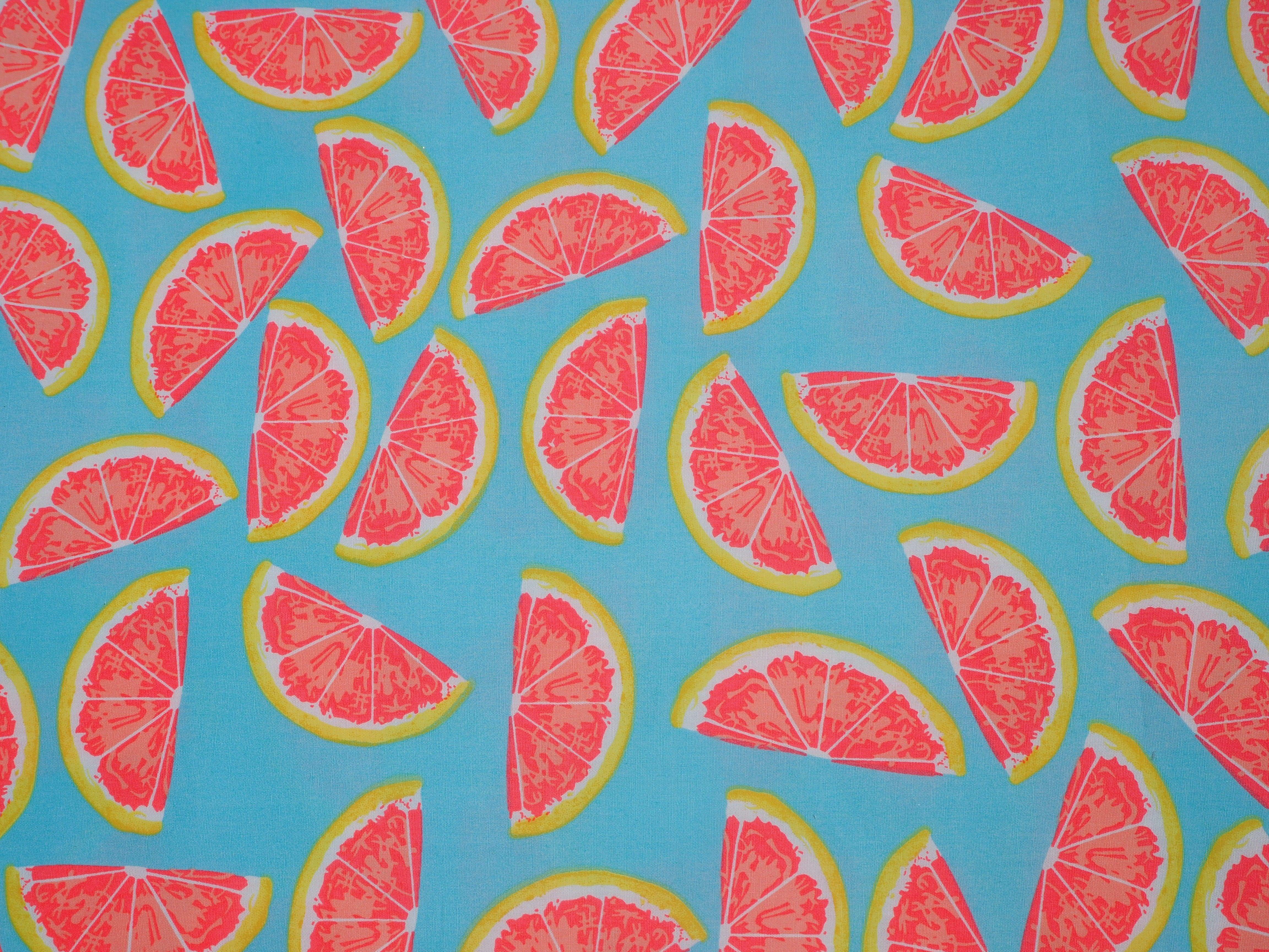 Slices of Citrus Fruit on Aqua Blue background, 100% cotton fabric