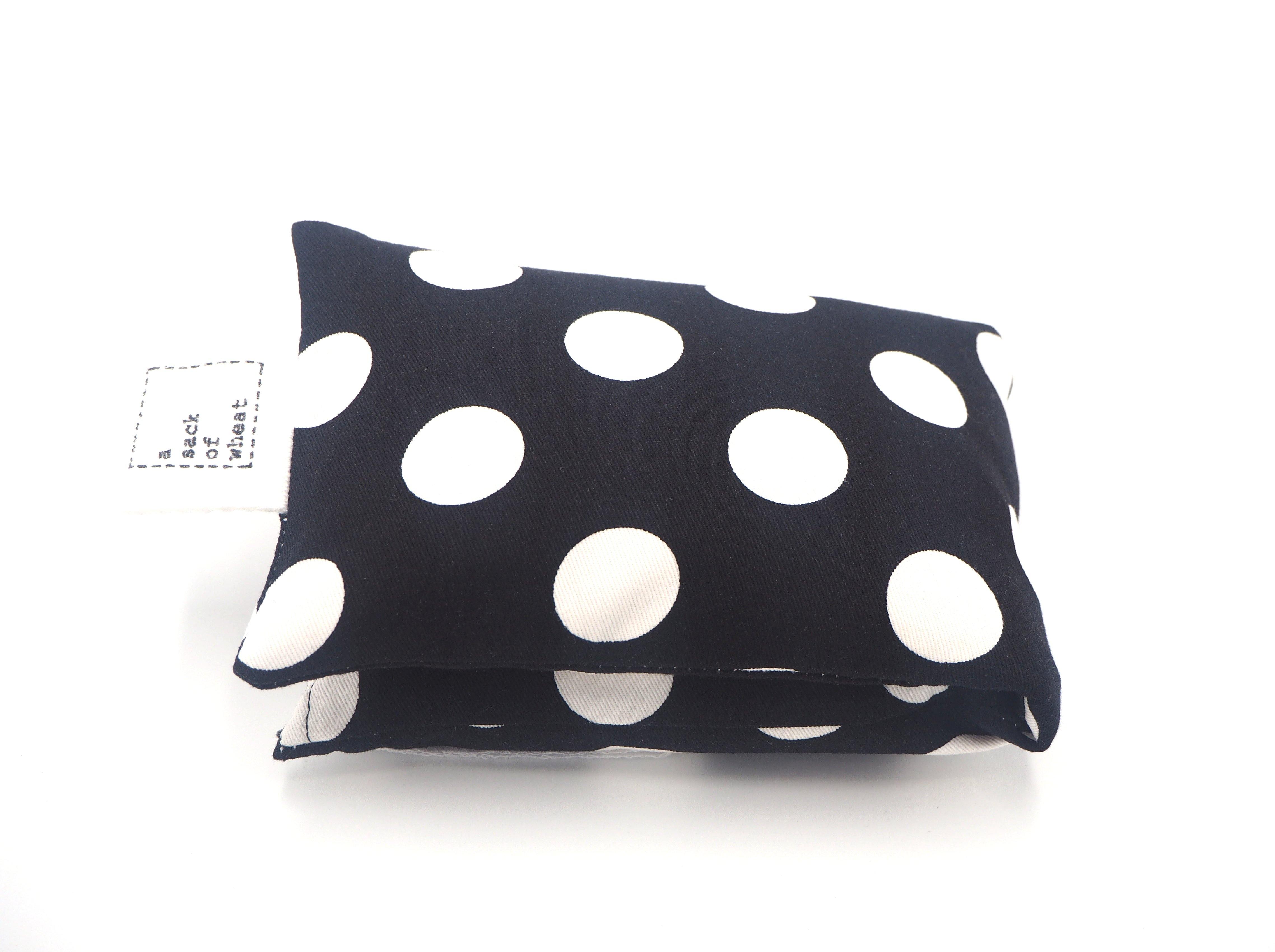 Folded view of A Sack Of Wheat, in a classic Black & White Polka Dot print, 100% cotton fabric