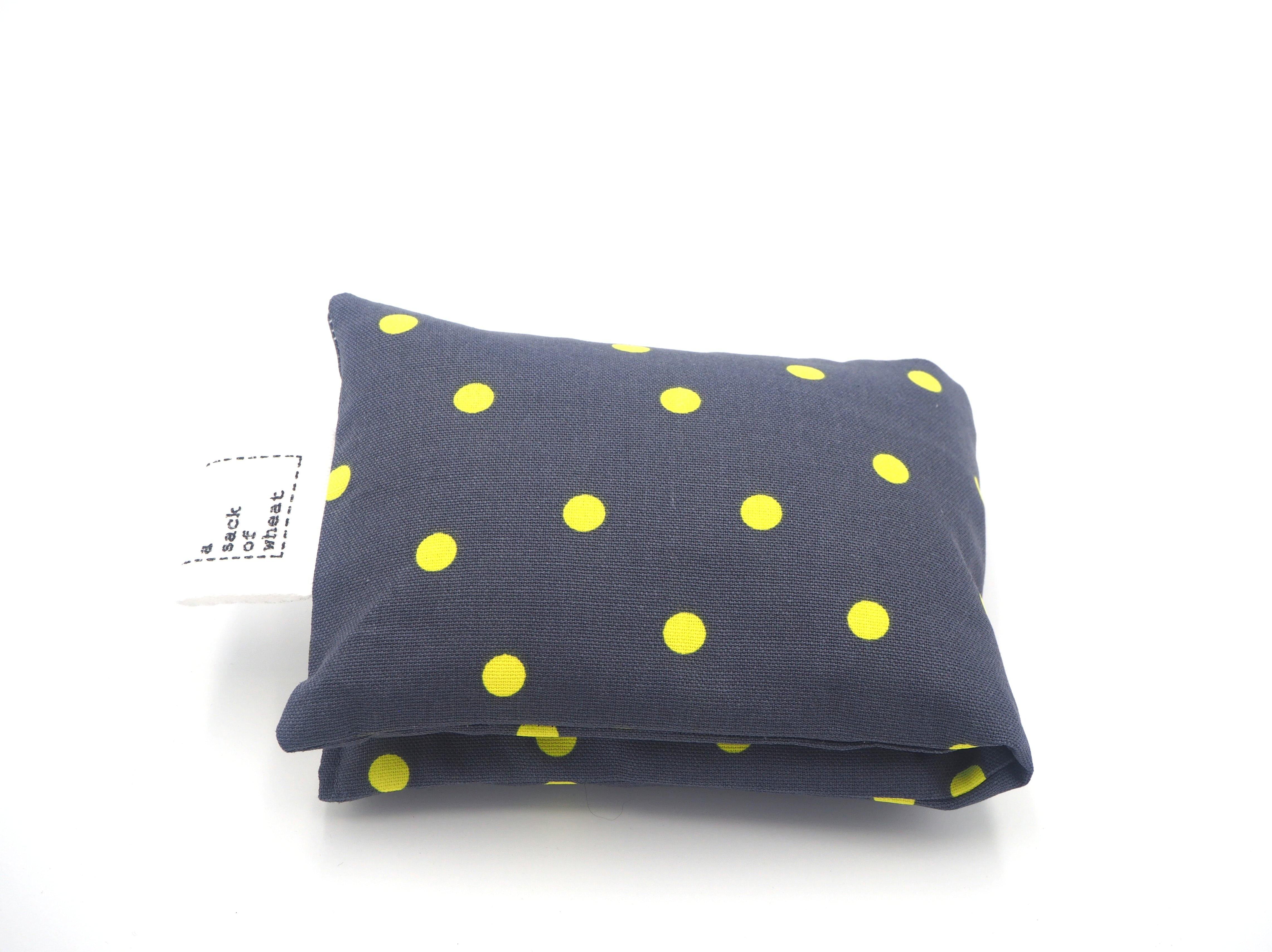 Folded view of A Sack Of Wheat, featuring Fluro yellow spots on Charcoal Grey background print, 100% cotton fabric