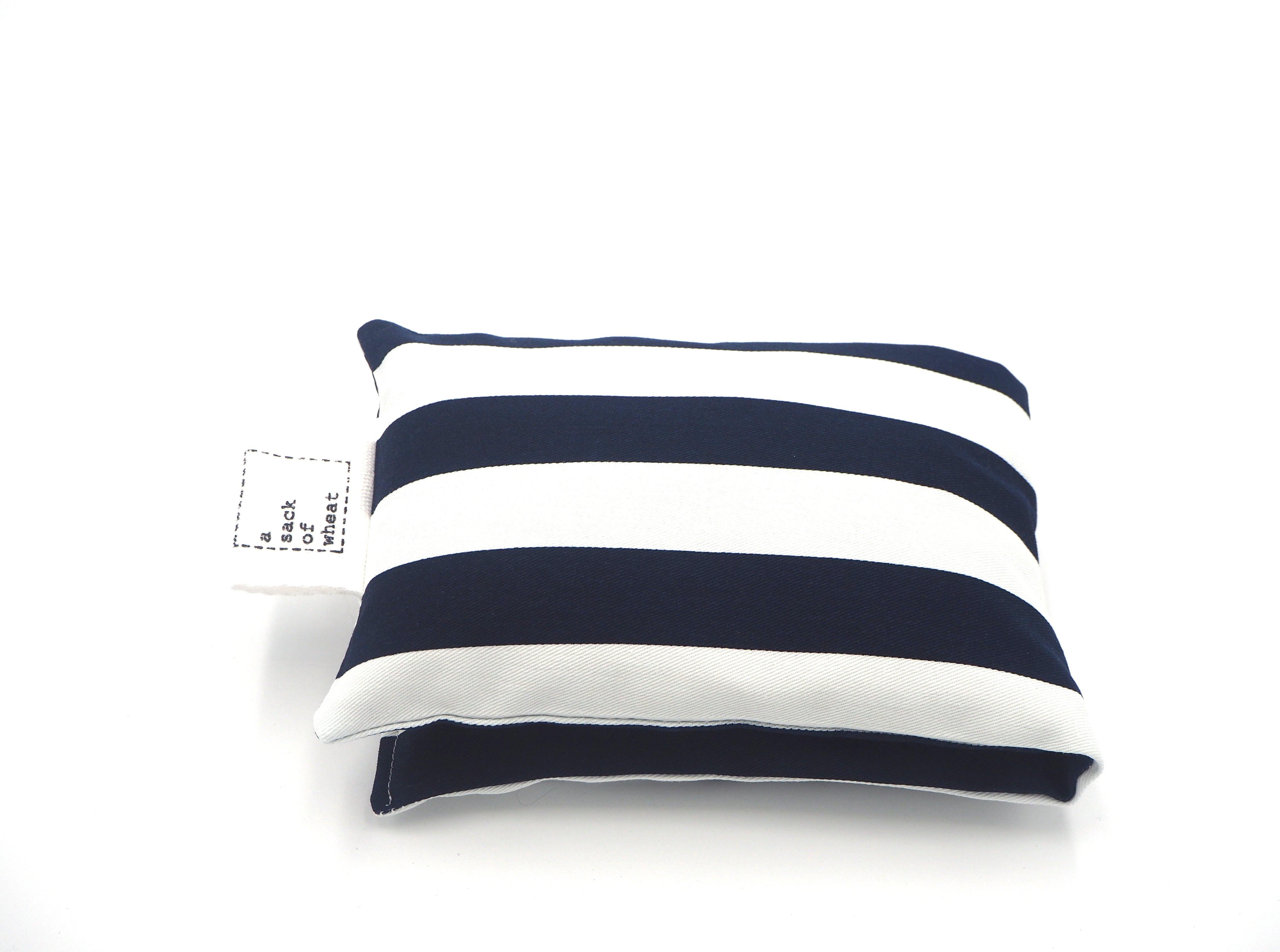 Folded view of A Sack Of Wheat, featuring a classic Navy & White striped print, 100% cotton fabric