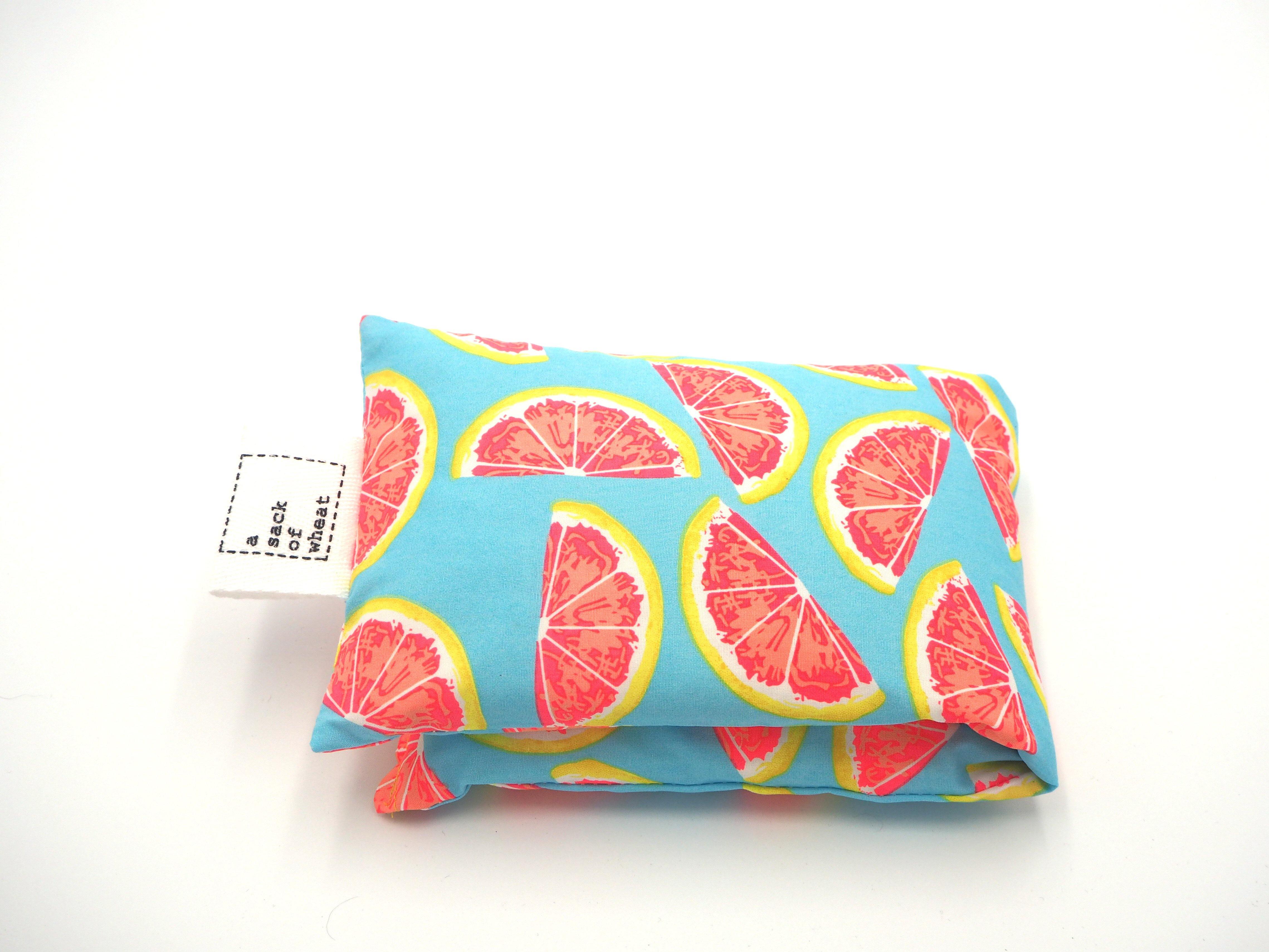 Folded view of A Sack Of Wheat, with slices of citrus fruit print on 100% cotton fabric