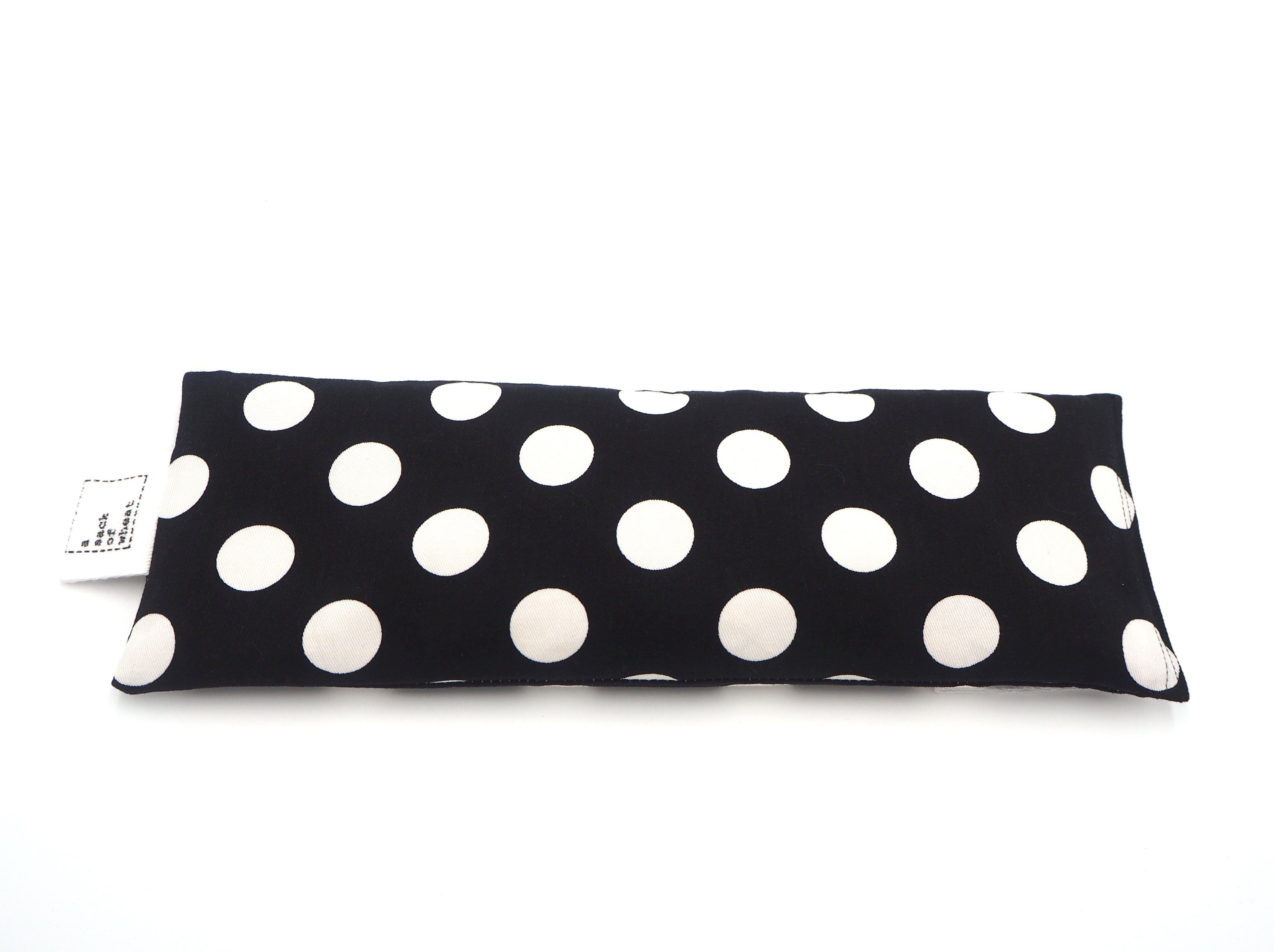 Flat view of A Sack Of Wheat, in a classic Black & White Polka Dot print, 100% cotton fabric