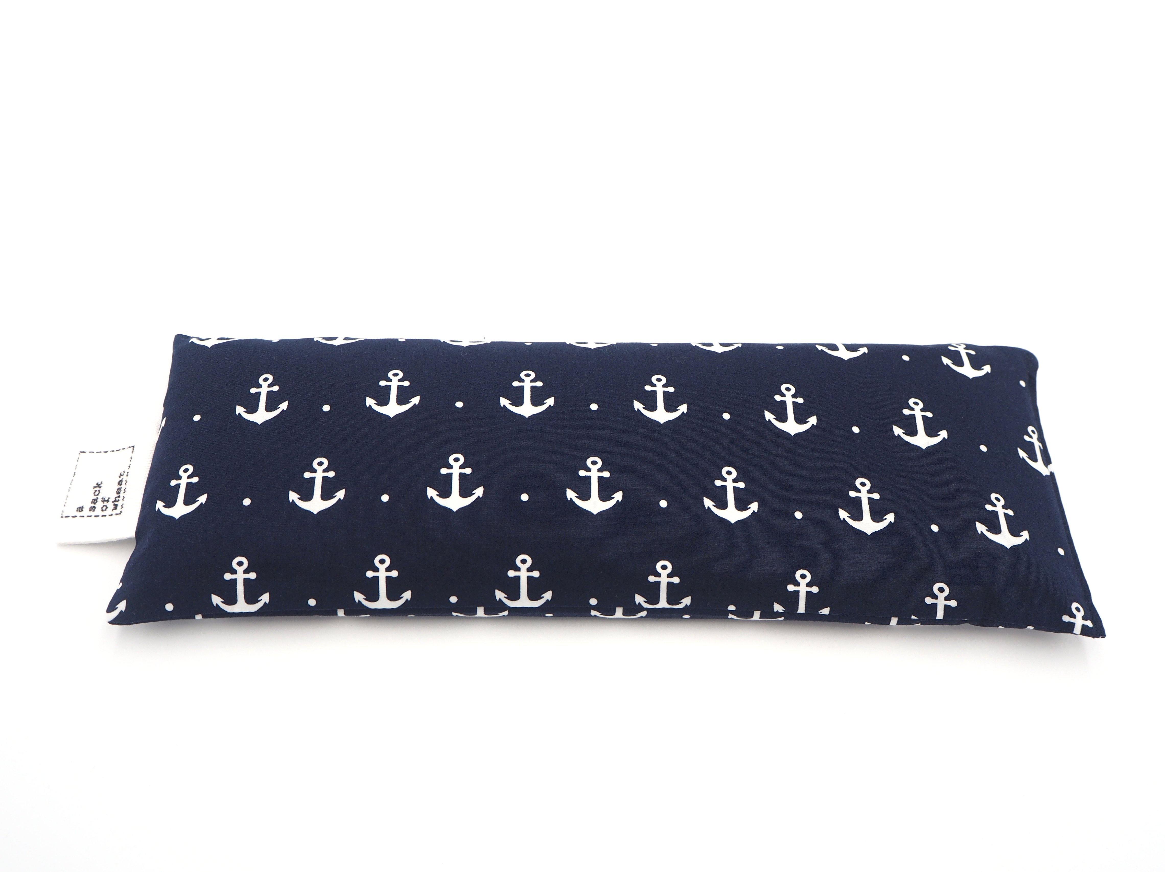Flat view of A Sack Of Wheat, featuring classic ship anchors on a royal navy blue background, 100% cotton fabric