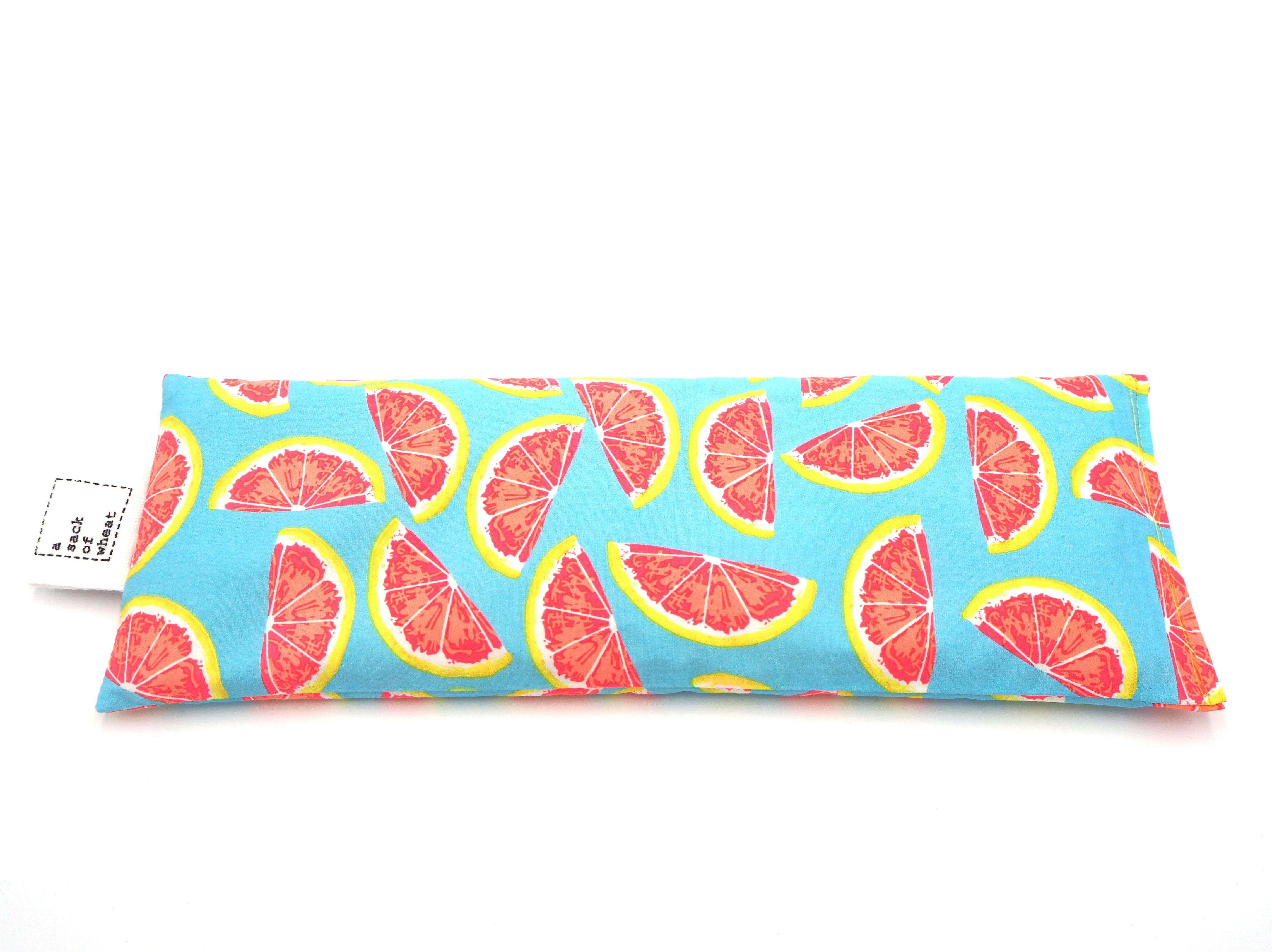 Flat view of A Sack Of Wheat, slices of citrus fruit print on 100% cotton fabric Image