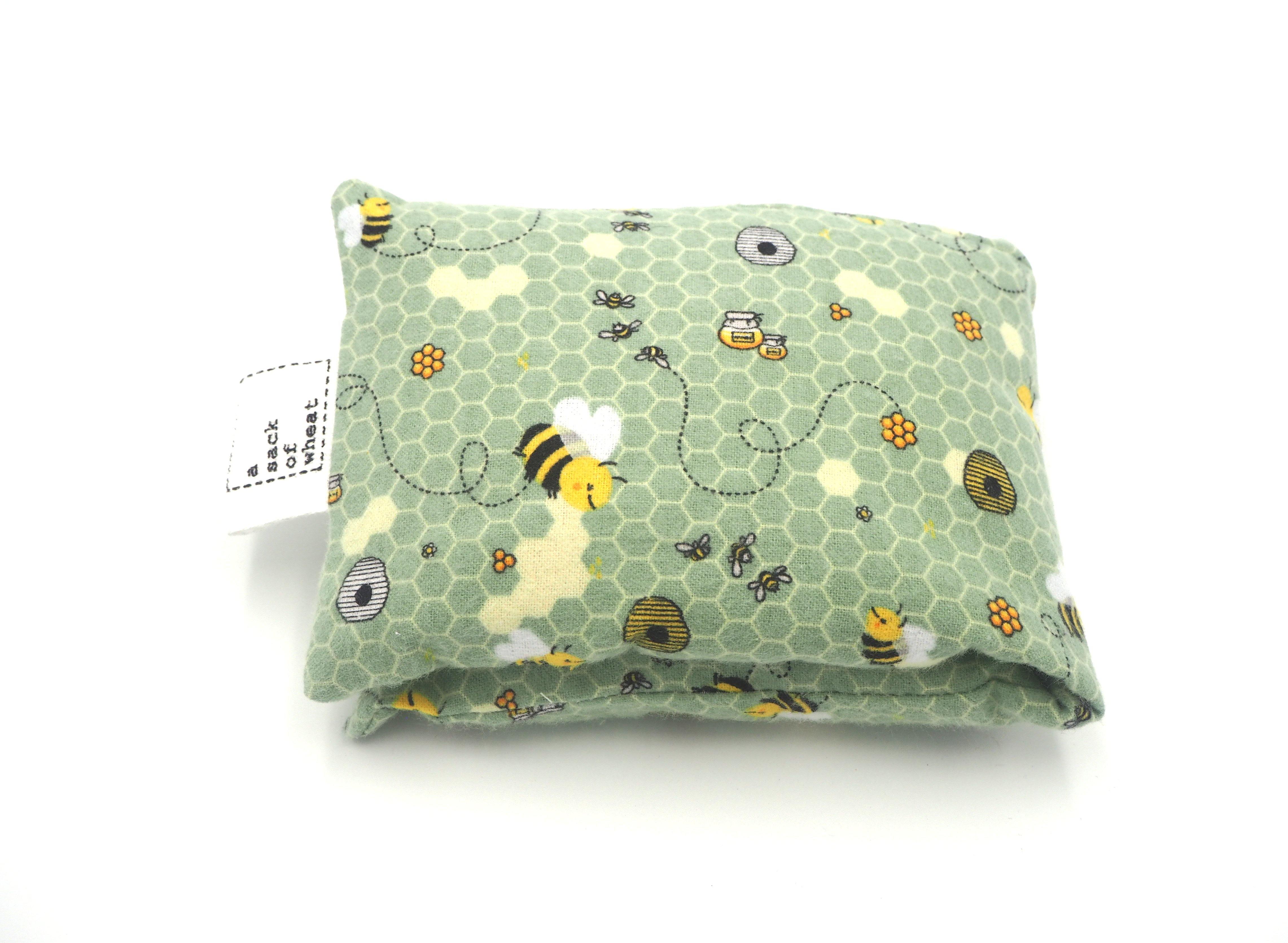 Folded view of A Sack Of Wheat, in a Busy Bee's making Honey print, 100% cotton Flannelette fabric