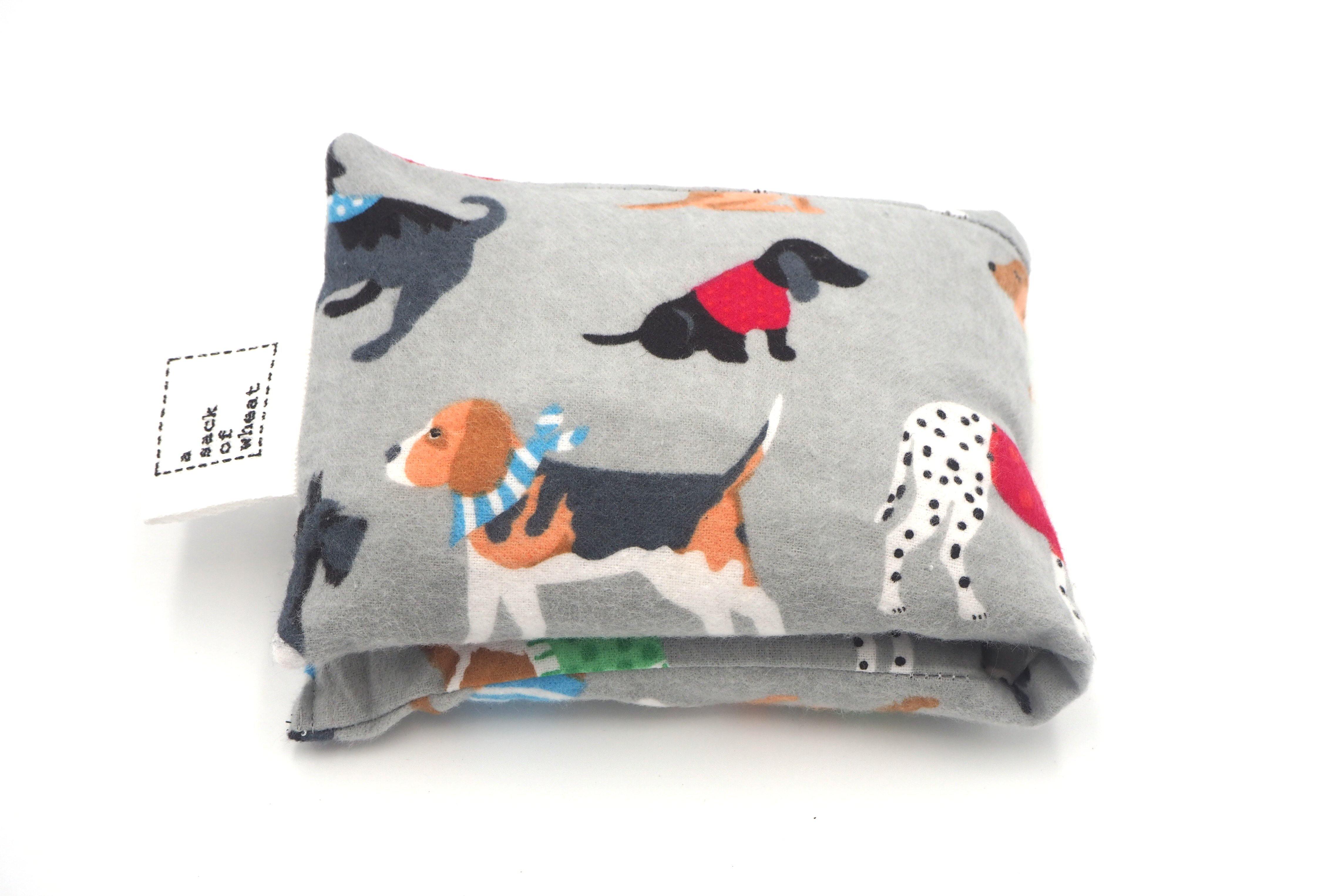 Folded view of A Sack Of Wheat, featuring Dressed Up Hound Dogs print on soft & fluffy grey flannelette, 100% cotton fabric