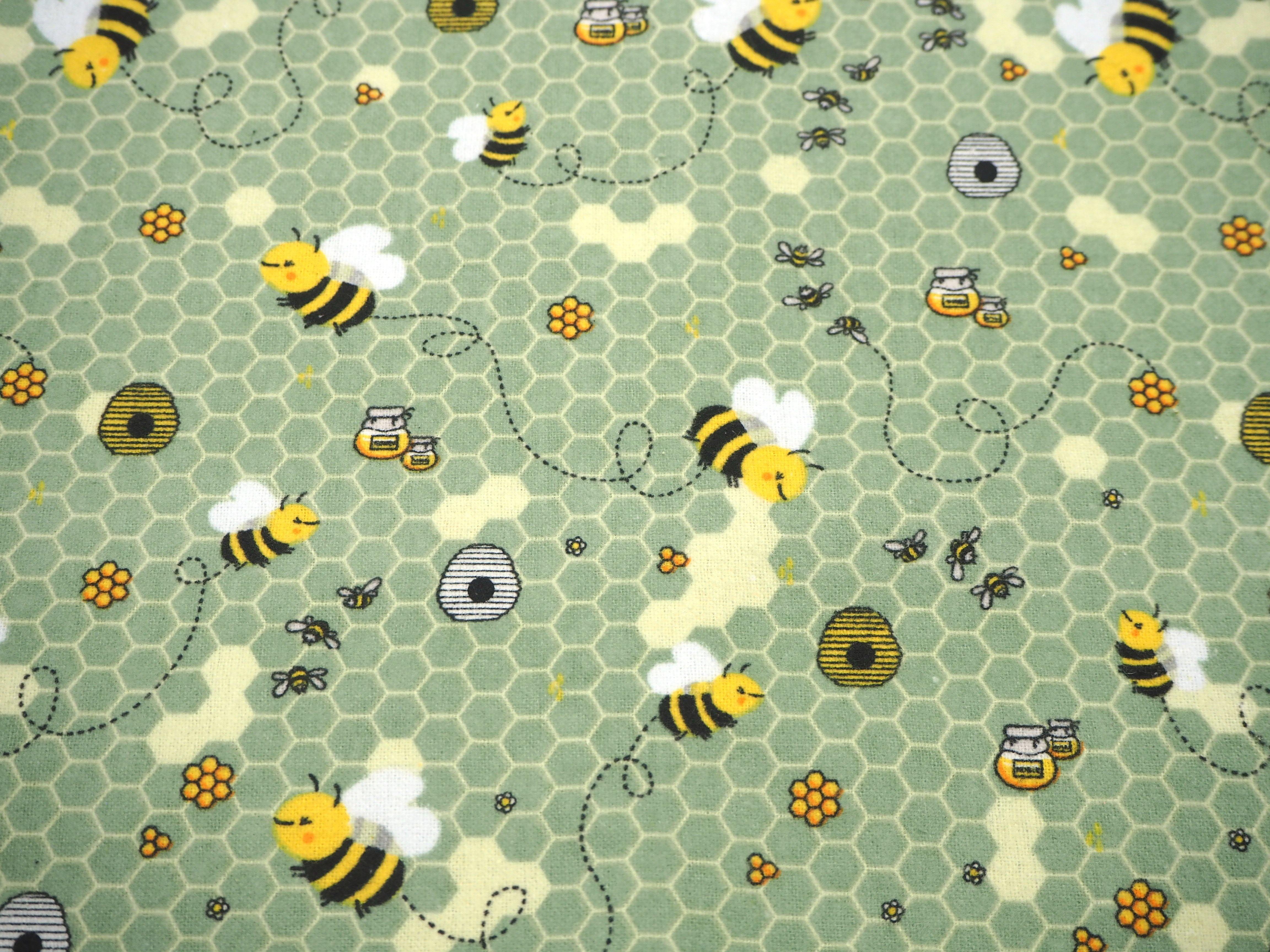 Busy Bees at work making honey print on soft green flannelette, 100% cotton fabric