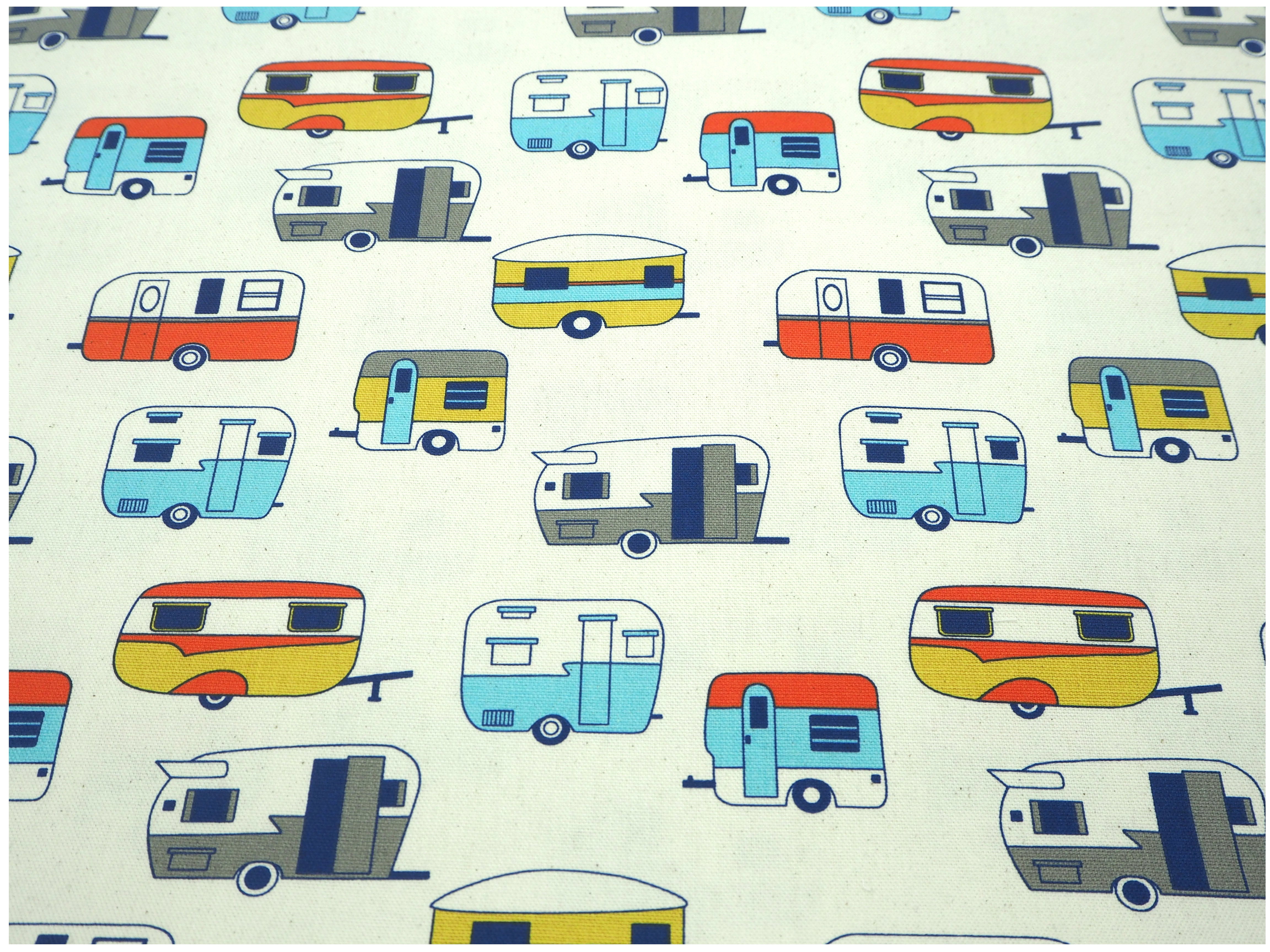 Fabric view of colorful classic caravans, on cream 100% cotton drill fabric 