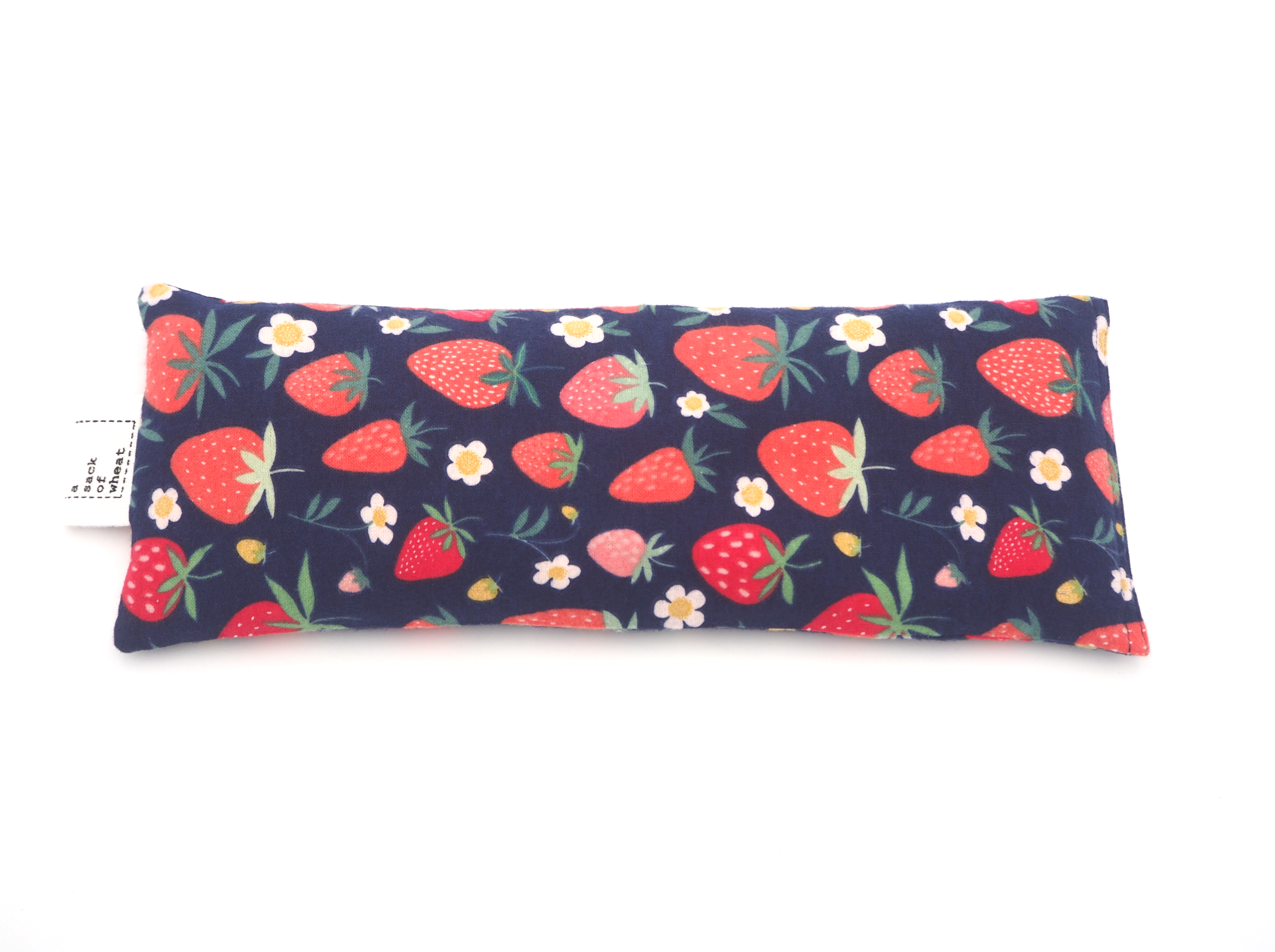 Flat image of strawberry themed wheat bag | 100% cotton fabric