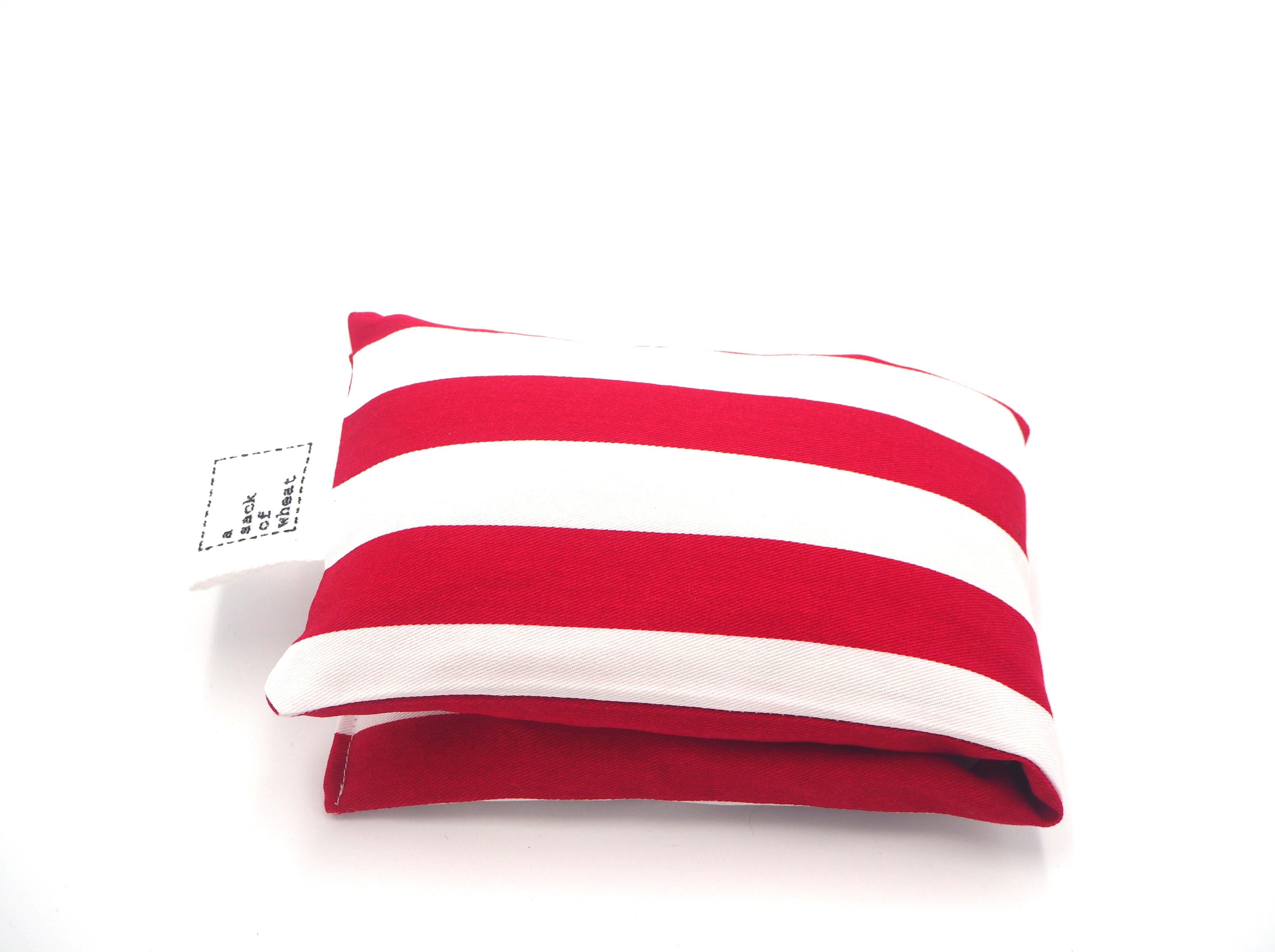 Folded view of A Sack Of Wheat, featuring the classic Red & White striped print, 100% cotton fabric