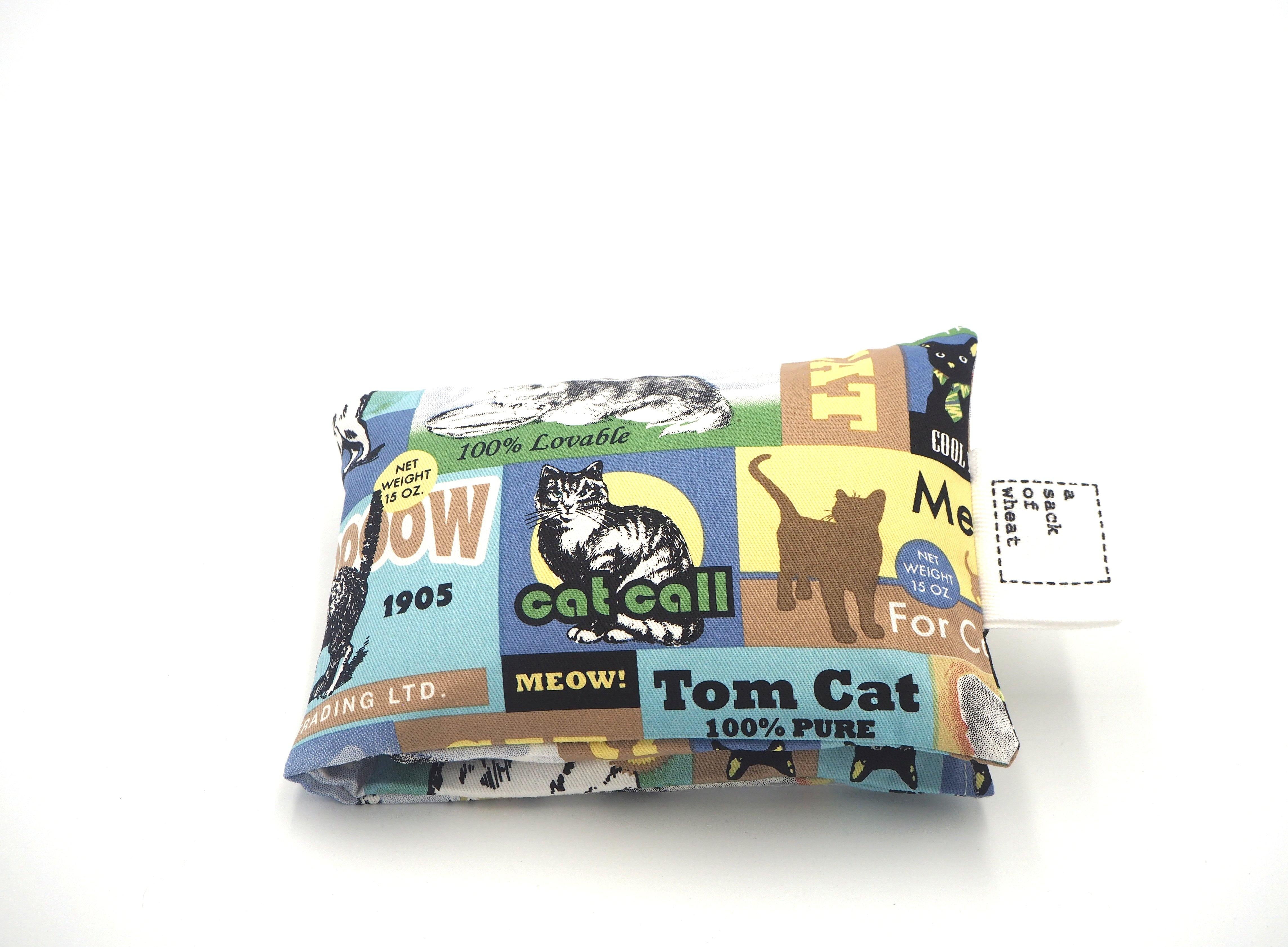 Folded view of A Sack Of Wheat, featuring vintage prints of cats & kittens on postage stamps and posters, 100% cotton fabric