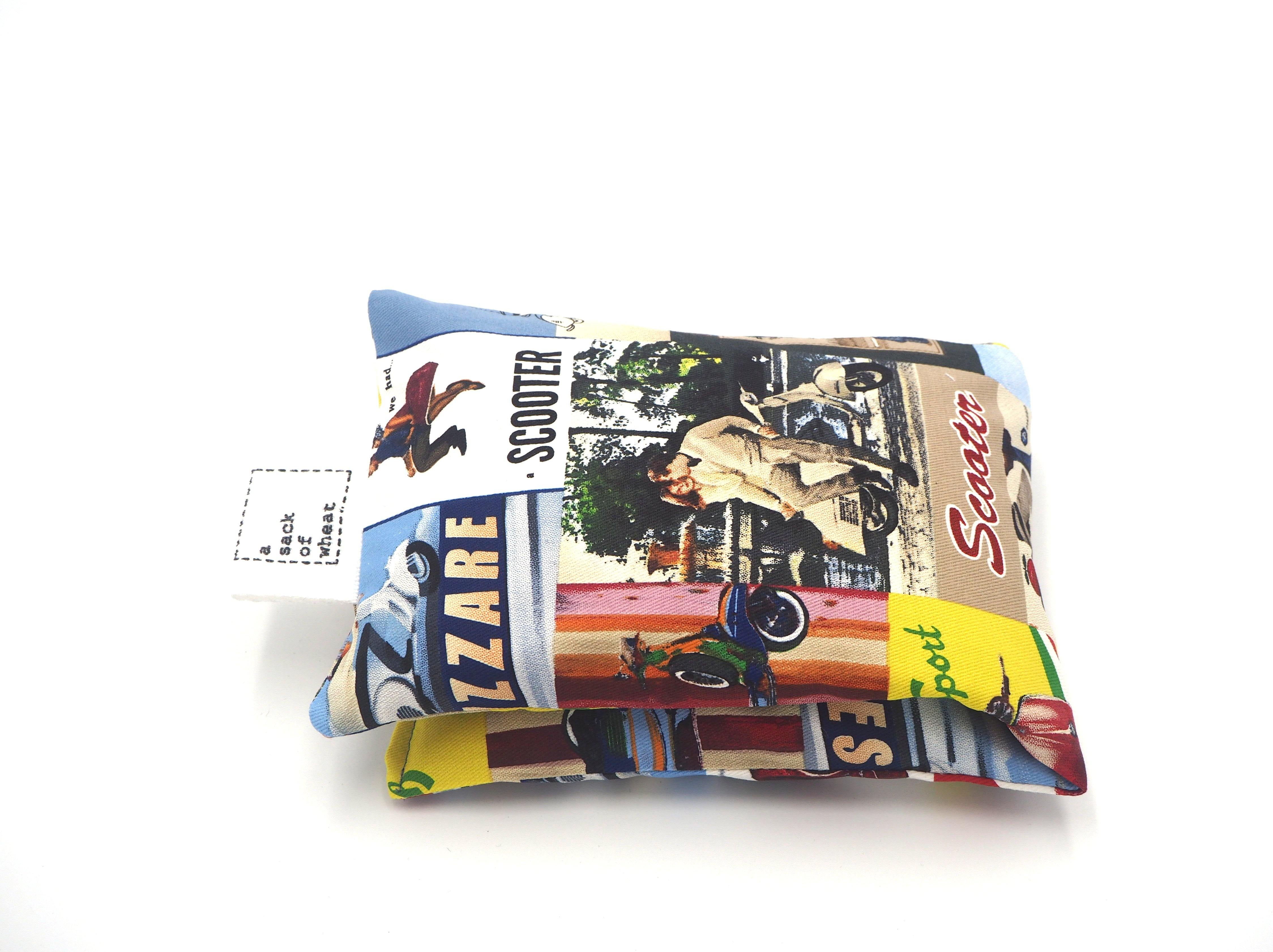 Folded view of A Sack Of Wheat, featuring Vintage scenes of classic Vesper scooter models & their stylish riders, 100% cotton fabric