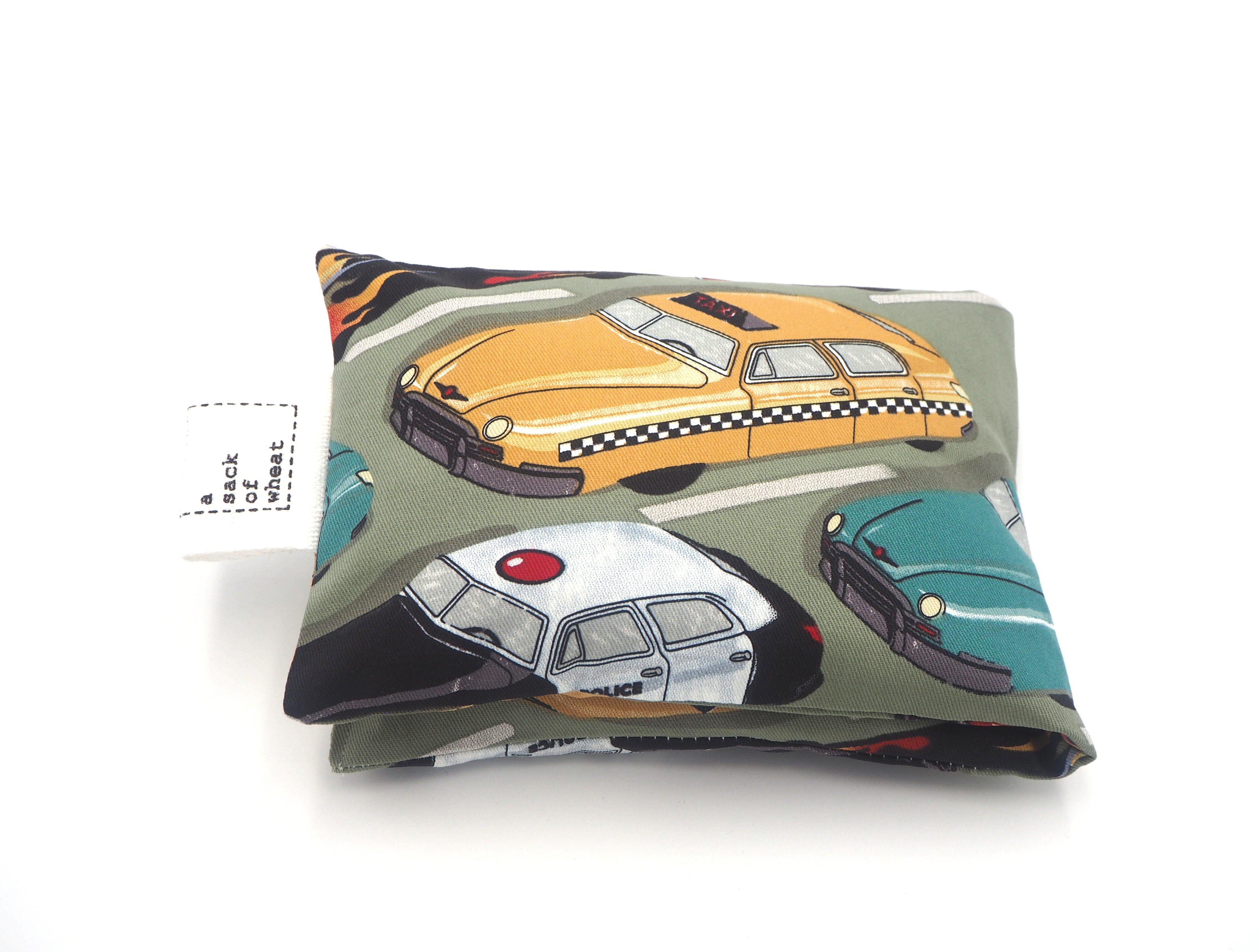 Folded view of A Sack Of Wheat, featuring vintage Taxi's, Sedan's & Police Cars, stuck in traffic print, 100% cotton fabric