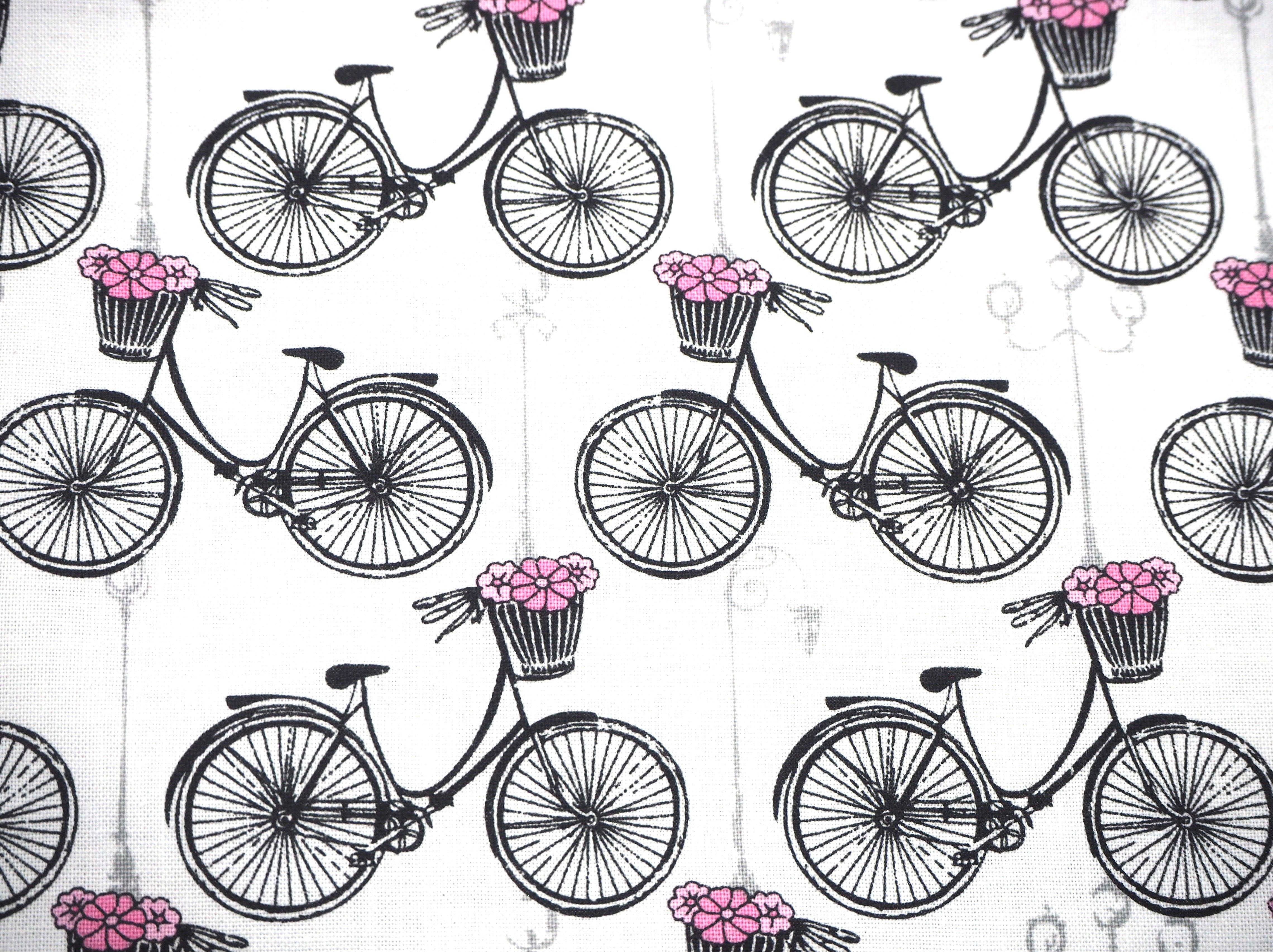 A Ladies Bicycle in Paris with handle bar flower basket print, on 100% cotton fabric