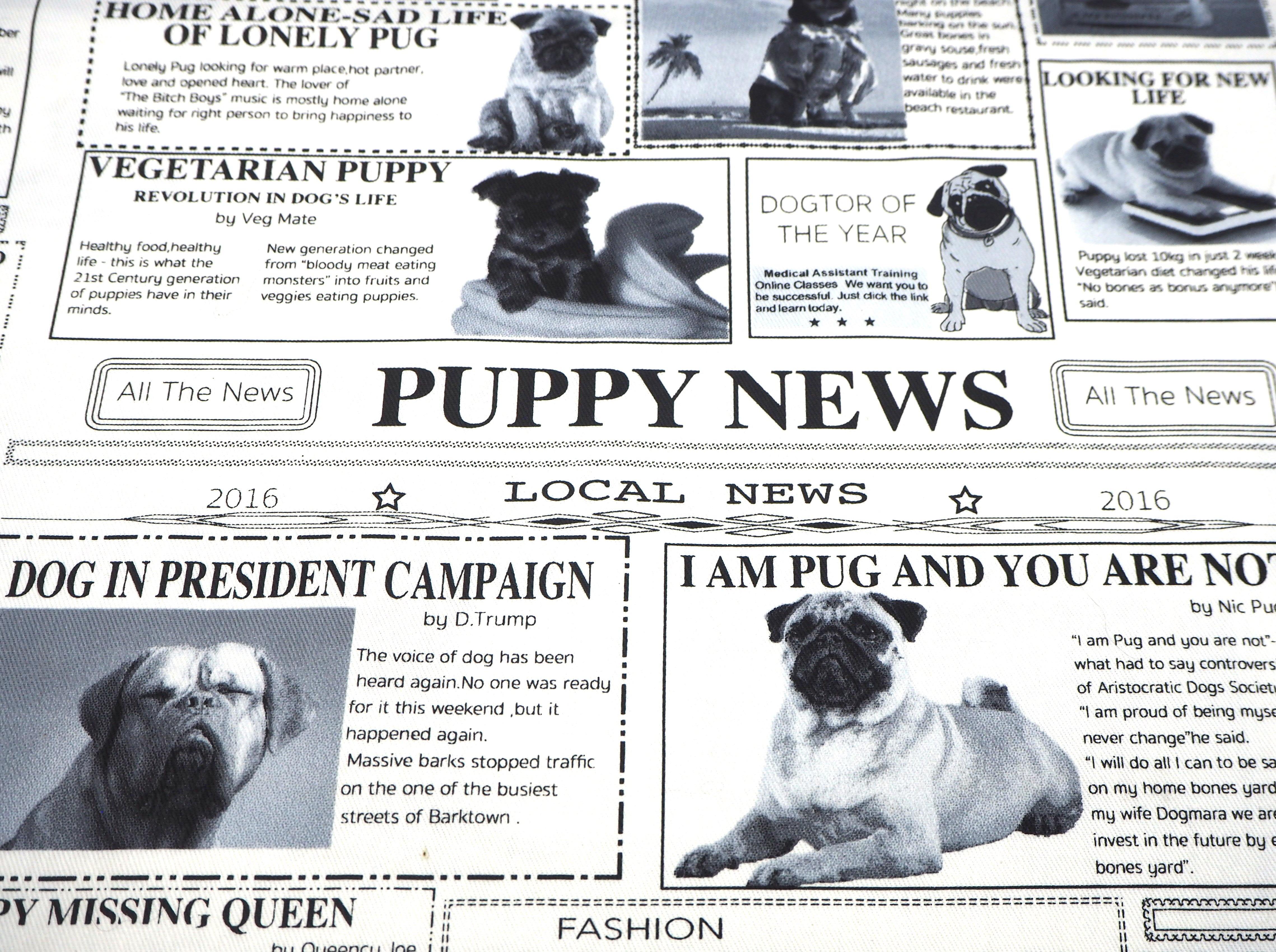 Black & white news print featuring "All the News!" on Pugs & Puppy's. 100% cotton fabric