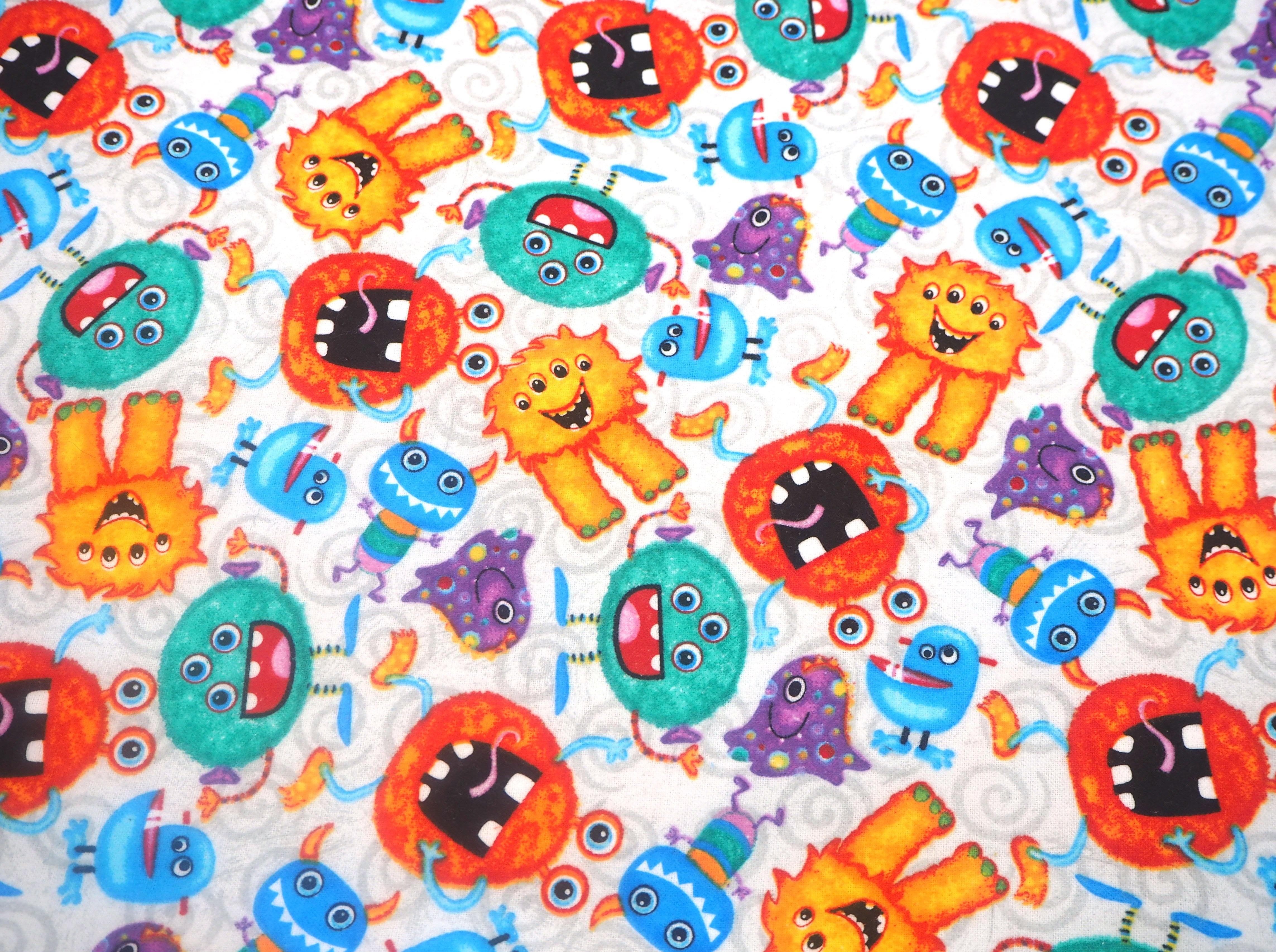 A colorful, friendly bunch of Monsters on fluffy, soft 100% cotton flannelette fabric