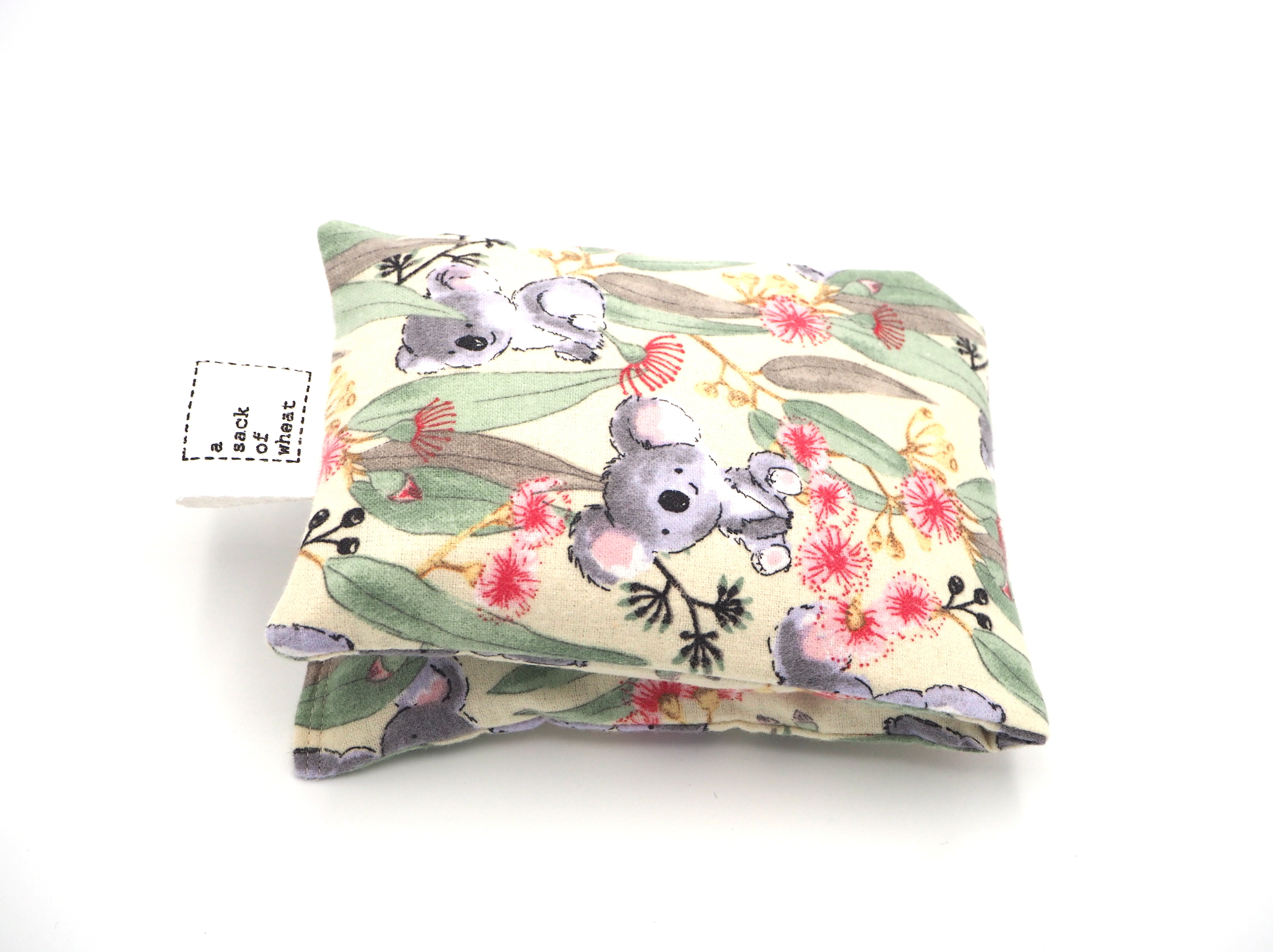 Folded view of A Sack Of Wheat, featuring cute Australian Koala's in the bush, on 100% cotton flannelette fabric